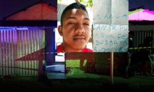 Jovem de 23 anos é executado na própria residência, invadida por criminosos, que deixaram bilhete junto ao corpo
