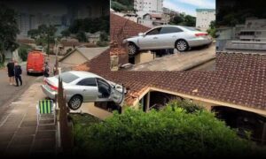 Carro quase invade residência pelo telhado e acaba “pendurado”. Menino de 6 anos estava sozinho no veículo